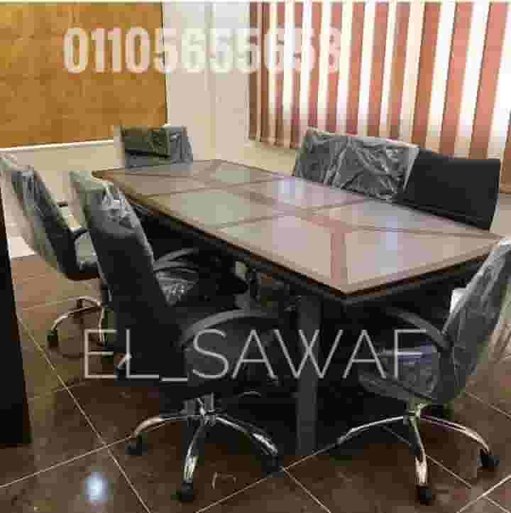 Wooden meeting table with paints