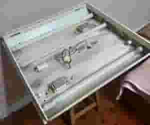 A flashlight for four fluorescent lamps 60 cm made of sheet