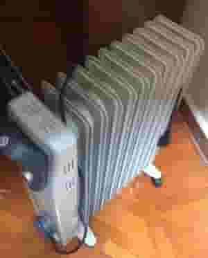 A ten feather oil heater like new for sale