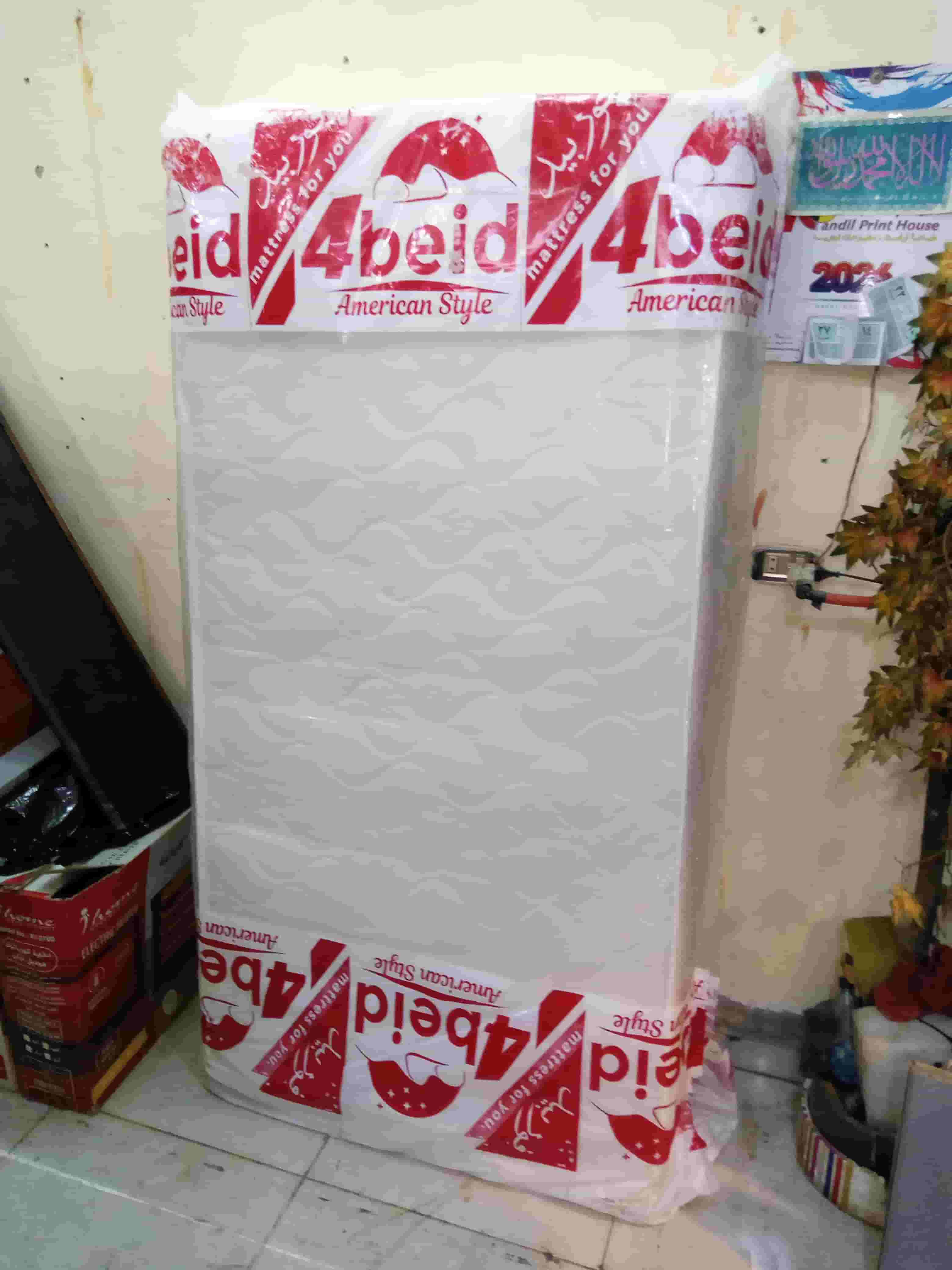 A new one-meter springform mattress with a bag that has not been used