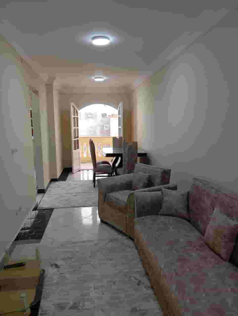 A real opportunity for a furnished apartment for annual rent for lovers of high-end housing and privacy on the main street Khaled Ibn Al-Walid