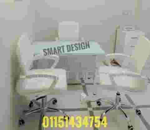 Securit glass desk with an electrostatic-coated stainless metal chassis available in all shapes and sizes and all office furniture