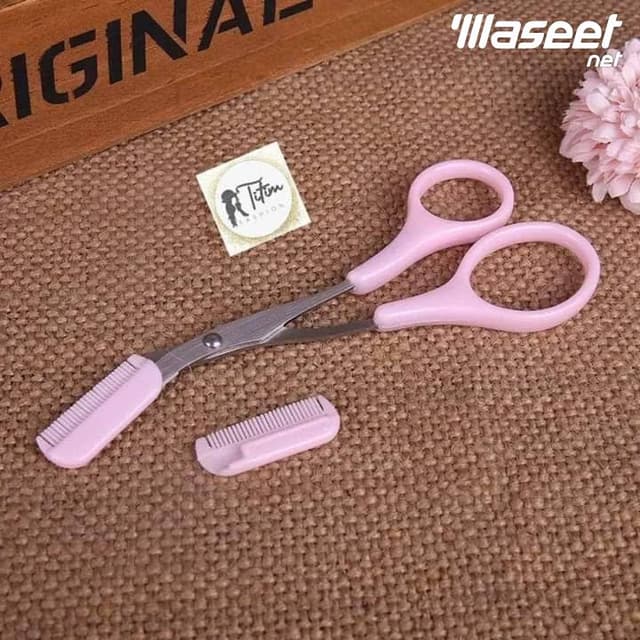 Eyebrow clipper with comb  