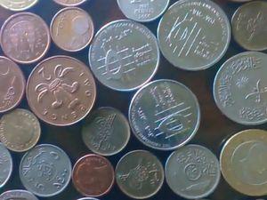 عملات معدنية عربية و اجنبية نادرة 1000ج